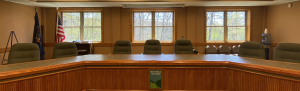Township meeting room: the main meeting desk and several chairs.